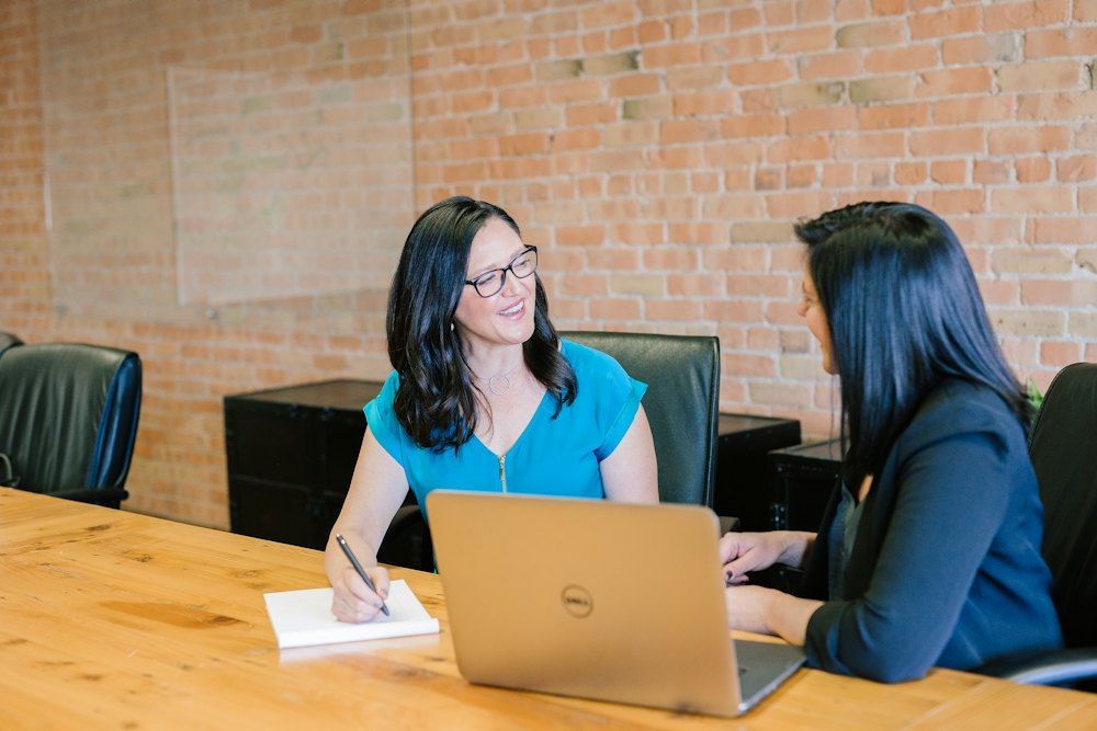 Consultant reviewing documents with a client